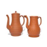 Two large redware coffee pots and one cover, mid 18th century, of baluster shape, finely turned with