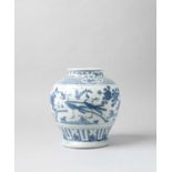 A CHINESE BLUE AND WHITE JAR, GUAN JIAJING/WANLI The baluster-shaped body painted with a wide