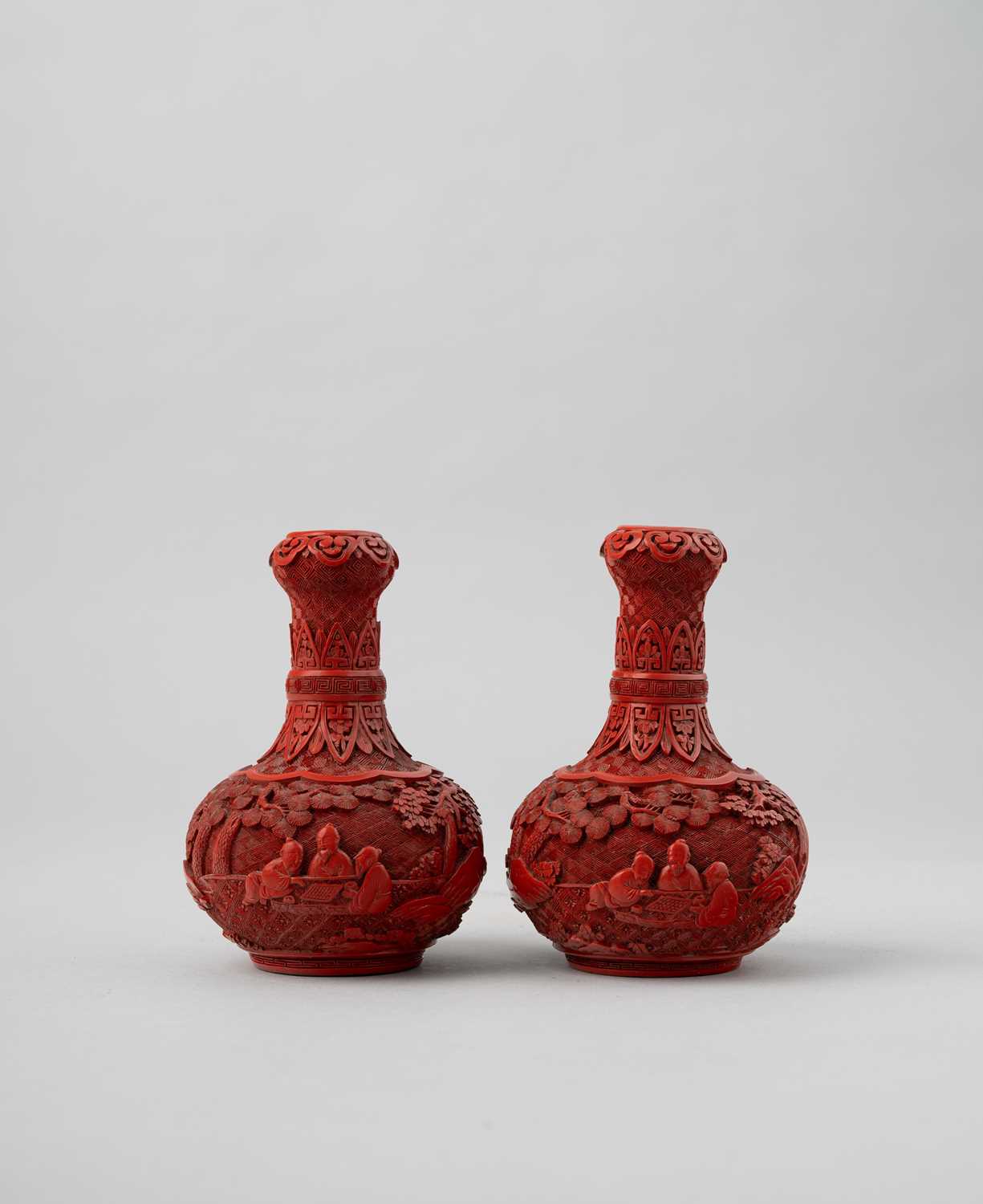 A PAIR OF SMALL CHINESE CINNABAR LACQUER 'SEVEN SCHOLARS' BOTTLE VASES QIANLONG 1736-95 The globular