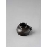 A CHINESE SILVER-INLAID ‘SHI SOU’ STYLE BRONZE WATERPOT 17TH/18TH CENTURY The vessel of beehive form