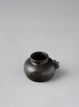 A CHINESE SILVER-INLAID ‘SHI SOU’ STYLE BRONZE WATERPOT 17TH/18TH CENTURY The vessel of beehive form