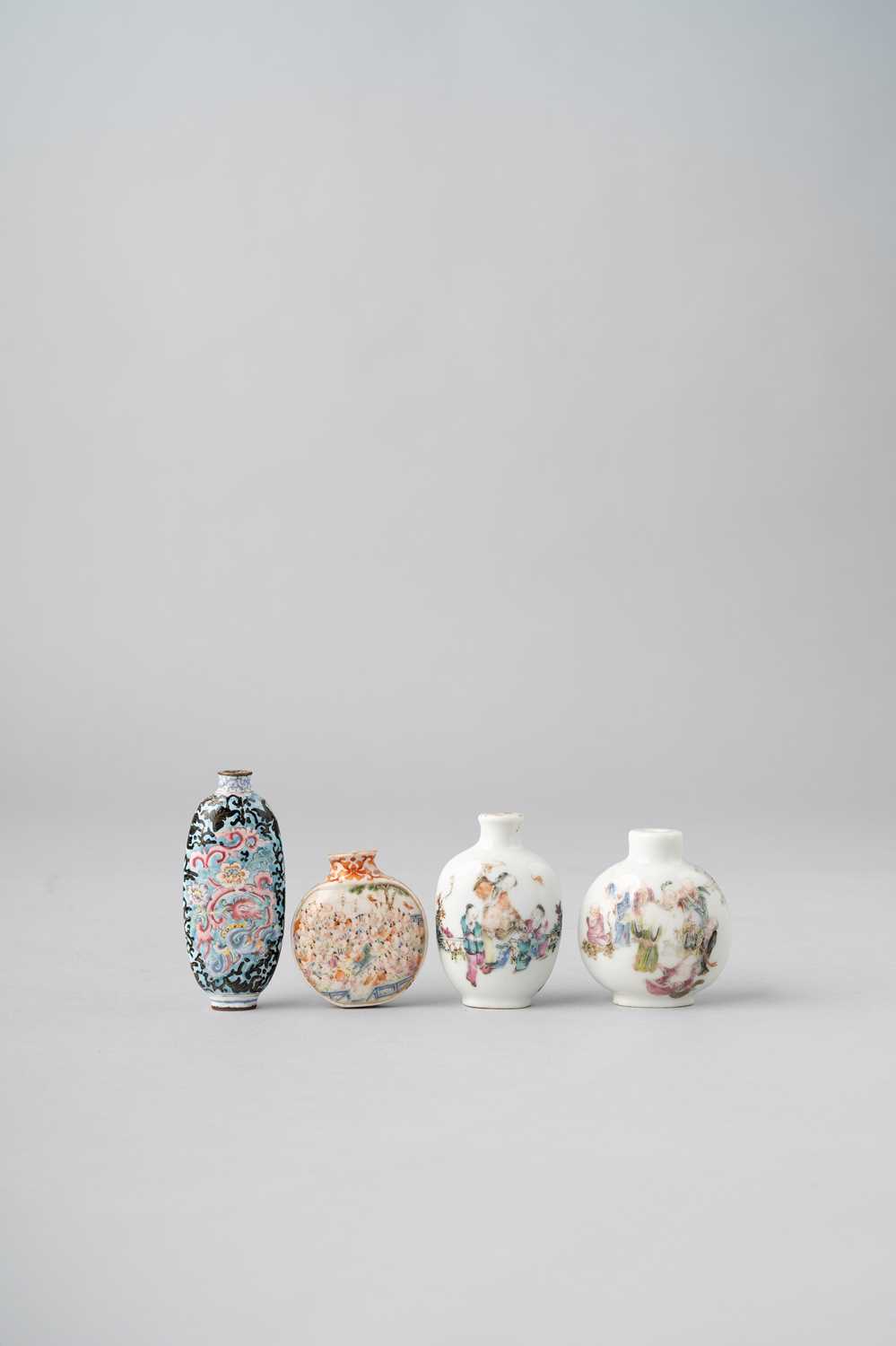 FOUR CHINESE SNUFF BOTTLES QING DYNASTY One a famille rose 'hundred boys' snuff bottle, with a