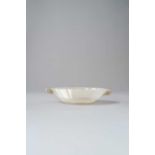 A WHITE JADE MUGHAL-STYLE OVAL BOWL 18TH/19TH CENTURY The thinly carved and highly polished bowl