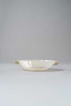 A WHITE JADE MUGHAL-STYLE OVAL BOWL 18TH/19TH CENTURY The thinly carved and highly polished bowl