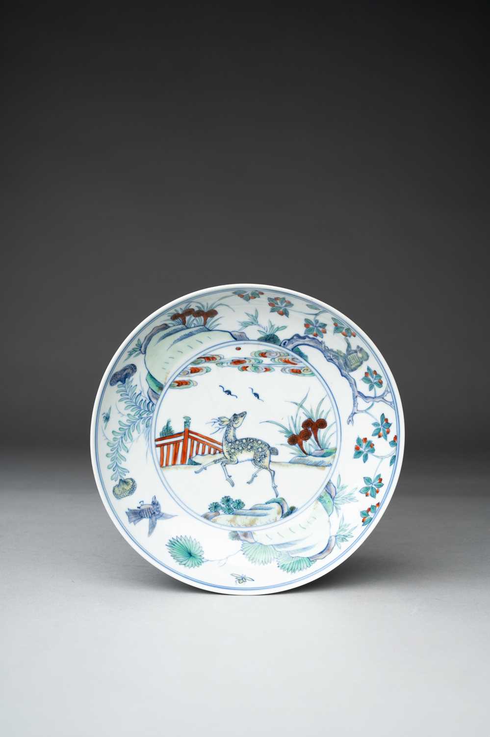 A CHINESE DOUCAI 'DEER' DISH SIX-CHARACTER YONGZHENG MARK AND OF THE PERIOD 1723-35 The interior