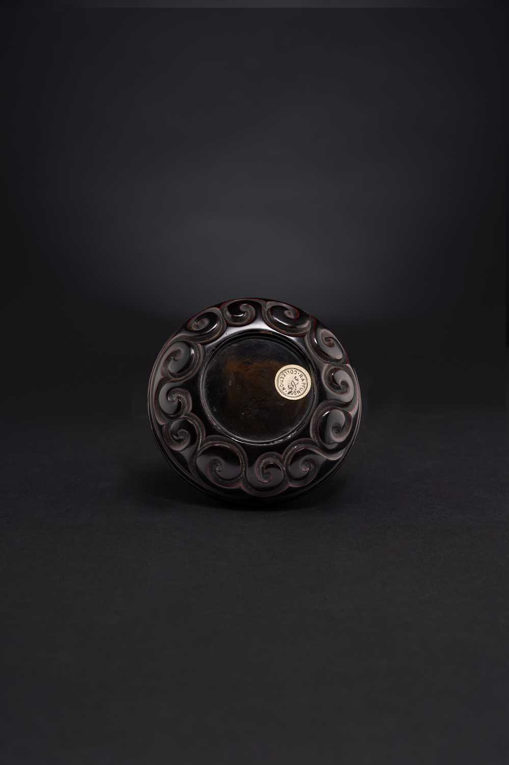 A CHINESE BLACK TIXI LACQUER BOX AND COVER MING DYNASTY The circular box and cover carved with - Image 2 of 3