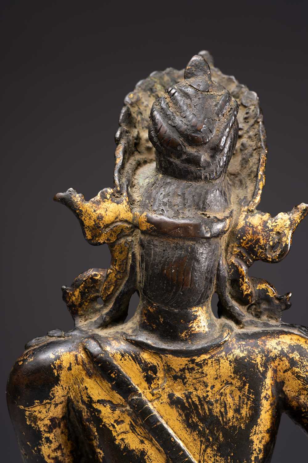 A RARE NEPALESE GILT-COPPER FIGURE OF INDRA 14TH CENTURY Seated in maharajalilasana with his right - Image 7 of 9