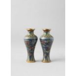 A SMALL PAIR OF CHINESE CLOISONNE ENAMEL 'BATS' VASES 18TH CENTURY The baluster-shaped bodies