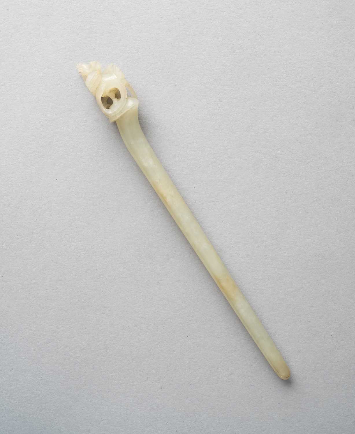 A CHINESE PALE CELADON JADE 'PHOENIX' HAIRPIN YUAN/EARLY MING DYNASTY Decorated with an openwork