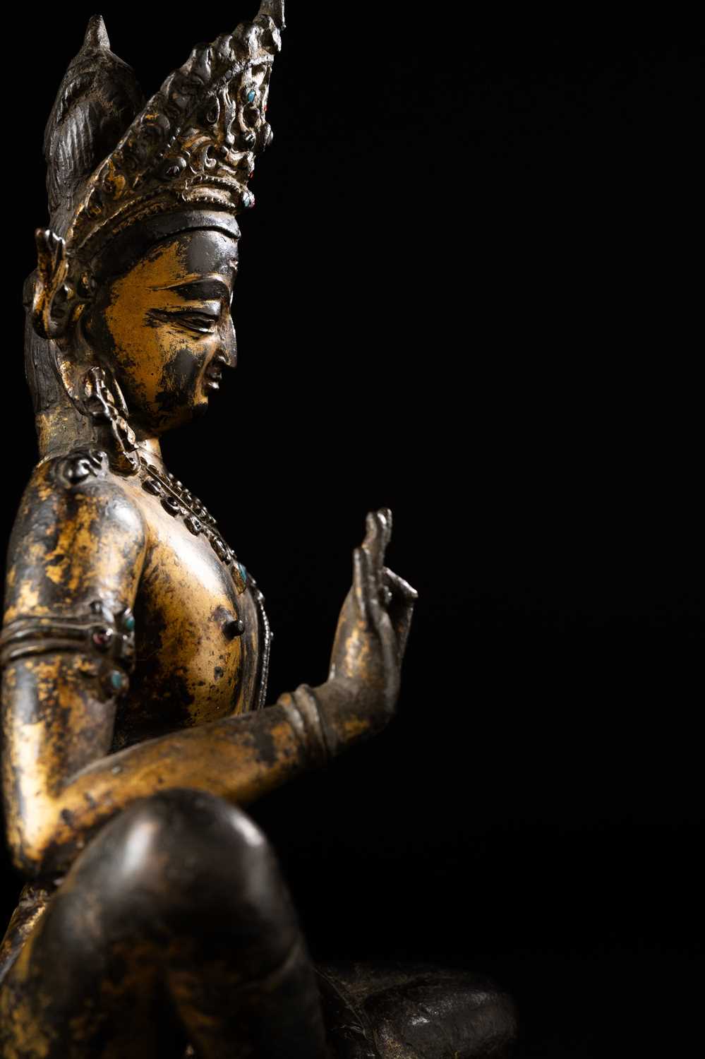 A RARE NEPALESE GILT-COPPER FIGURE OF INDRA 14TH CENTURY Seated in maharajalilasana with his right - Image 3 of 9