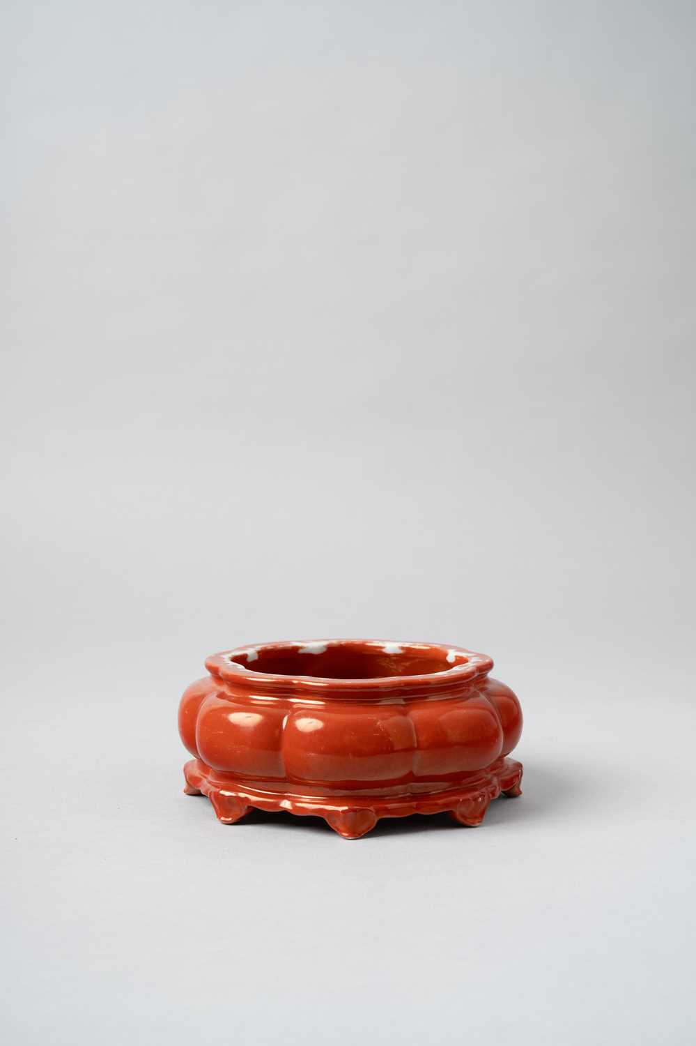 A RARE CHINESE CORAL-GROUND BRUSH WASHER 18TH CENTURY The compressed lobed body below a shaped rim