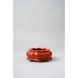 A RARE CHINESE CORAL-GROUND BRUSH WASHER 18TH CENTURY The compressed lobed body below a shaped rim