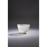 A RARE MINIATURE WHITE JADEITE MUGHAL-STYLE CUP 18TH/19TH CENTURY Finely carved as a chrysanthemum
