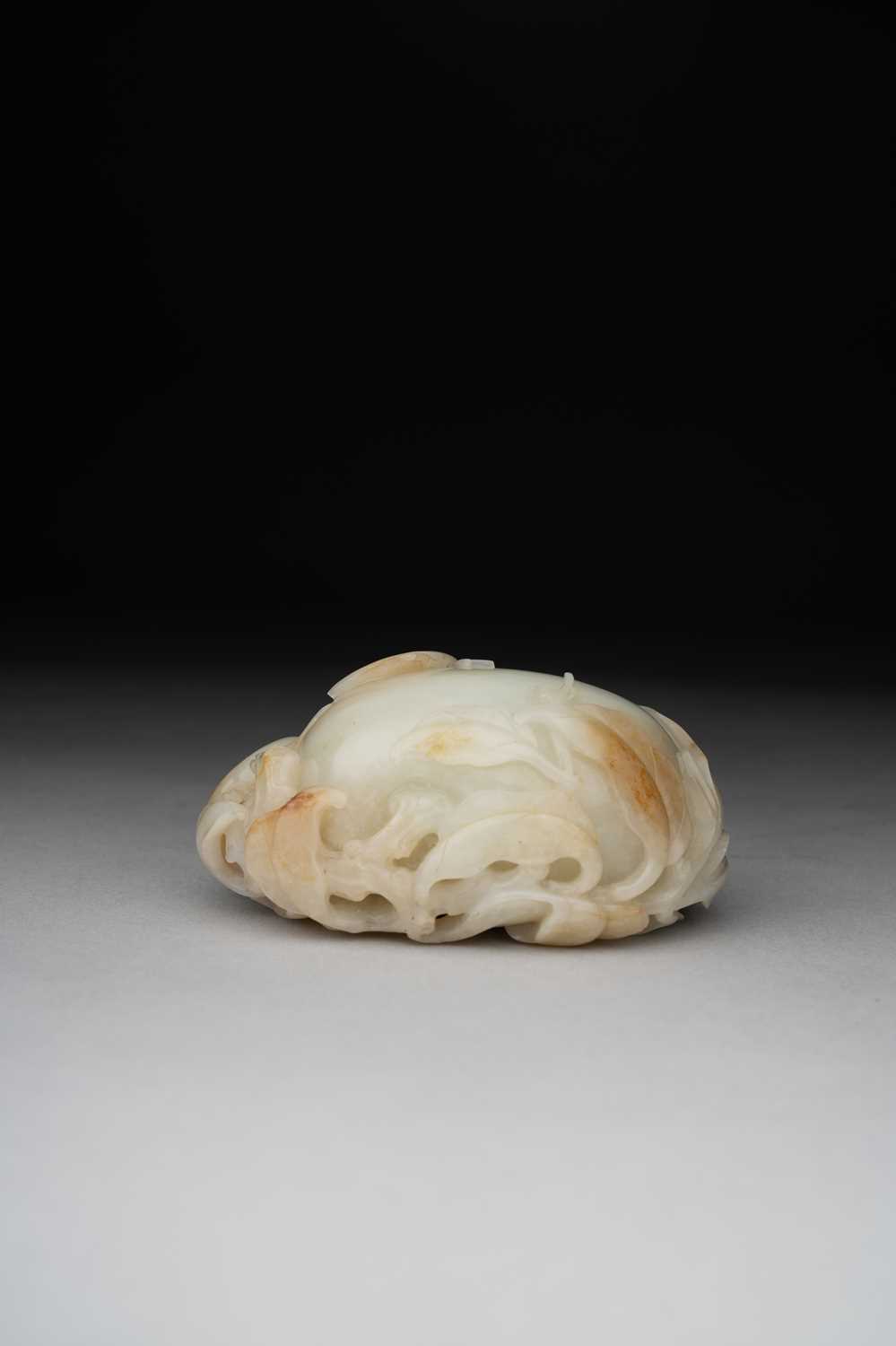 A FINE CHINESE CELADON JADE 'POMEGRANATE' GROUP QIANLONG 1736-95 Carved as two pomegranates