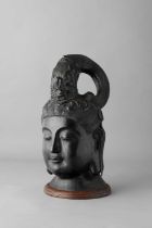 AN UNUSUAL CHINESE BRONZE HEAD OF GUANYIN PROBABLY REPUBLIC PERIOD With a meditative expression