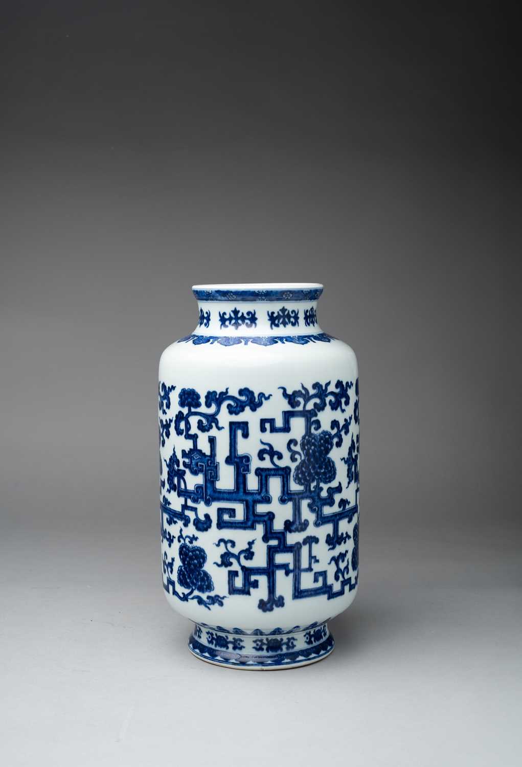 A LARGE AND RARE CHINESE BLUE AND WHITE LANTERN-SHAPED VASE YONGZHENG 1723-35 The cylindrical body