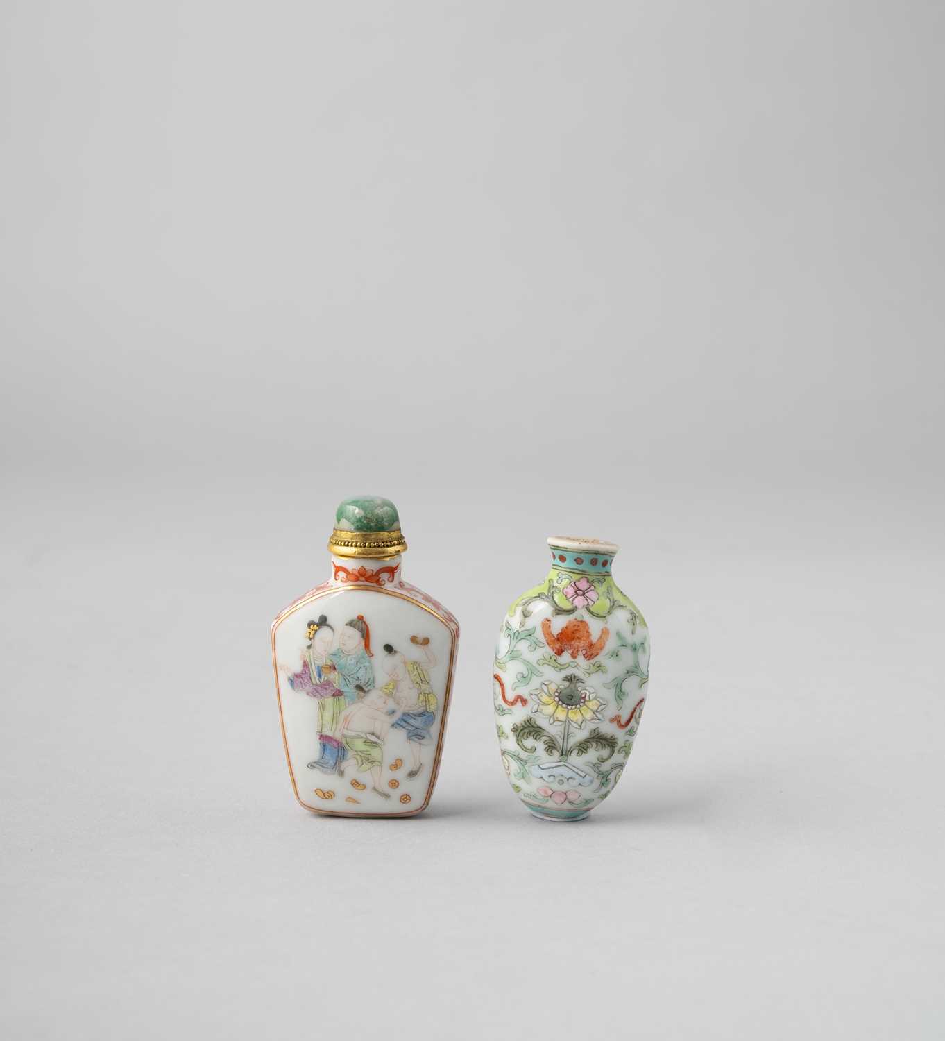 TWO CHINESE FAMILLE ROSE SNUFF BOTTLES 18TH AND 19TH CENTURY One of pebble form, decorated with