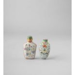 TWO CHINESE FAMILLE ROSE SNUFF BOTTLES 18TH AND 19TH CENTURY One of pebble form, decorated with