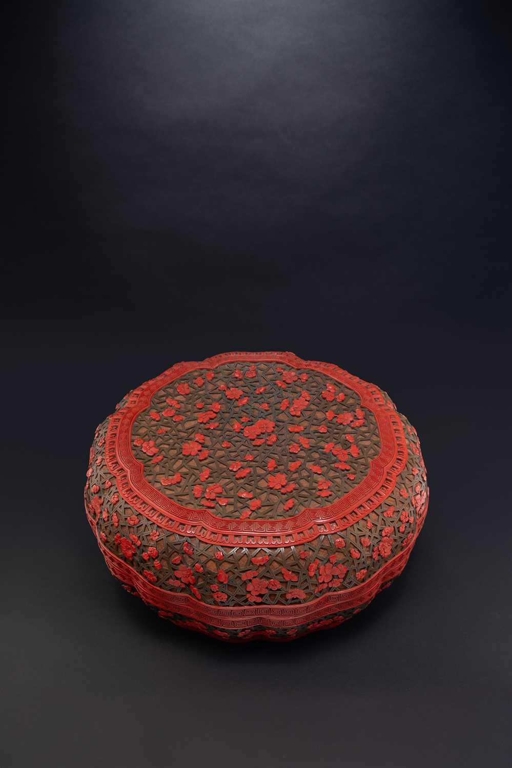 A LARGE AND RARE CHINESE THREE-COLOURED LACQUER 'PRUNUS' BOX AND COVER QIANLONG 1736-95 Of mallow
