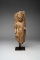 A CHINESE LIMESTONE STELE OF A BODHISATTVA SUI DYNASTY The figure carved in high relief, depicted