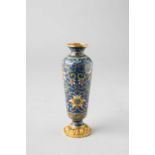 A TALL CHINESE CLOISONNE ENAMEL 'LOTUS' VASE 18TH CENTURY The slender body tapering towards a gently