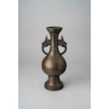 A RARE CHINESE BRONZE ARCHAISTIC ALTAR VASE HONGZHI 1488-1505 The pear-shaped body raised on a