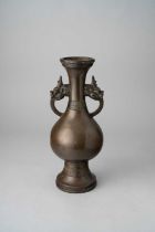 A RARE CHINESE BRONZE ARCHAISTIC ALTAR VASE HONGZHI 1488-1505 The pear-shaped body raised on a