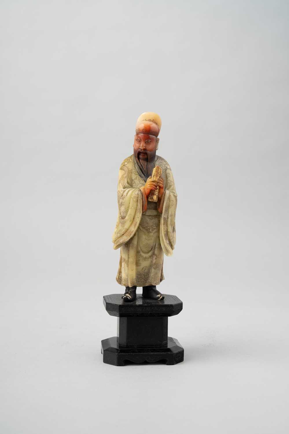 A CHINESE SOAPSTONE FIGURE OF CAO GUOJIU 18TH CENTURY The Daoist Immortal is depicted standing