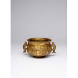 A SMALL CHINESE GILT BRONZE 'BAJIXIANG' INCENSE BURNER 17TH/18TH CENTURY The body cast in relief