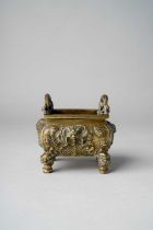 A CHINESE GILT-BRONZE RECTANGULAR 'DRAGON' INCENSE BURNER LATE QING DYNASTY The sides cast and