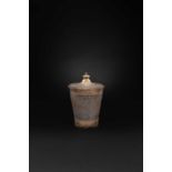 A MUGHAL PARCEL-GILT SILVER BEAKER AND COVER 19TH CENTURY The tapering body and cover with a