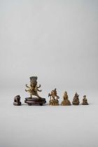 NO RESERVE A SMALL COLLECTION OF HIMALAYAN GILT-METAL ITEMS 17TH CENTURY AND LATER Comprising: a