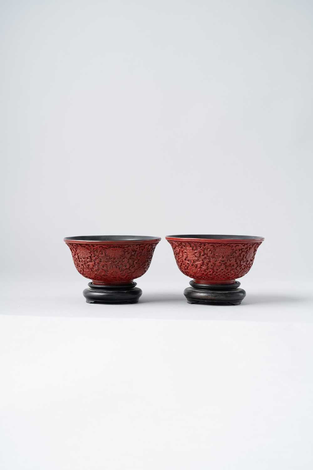 NO RESERVE A PAIR OF CHINESE CINNABAR LACQUER 'BAJIXIANG' BOWLS QIANLONG 1736-95 Each decorated to