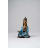 A CHINESE CHAMPLEVE ENAMEL FIGURE OF GUANYIN QING DYNASTY Dressed in flowing robes decorated with