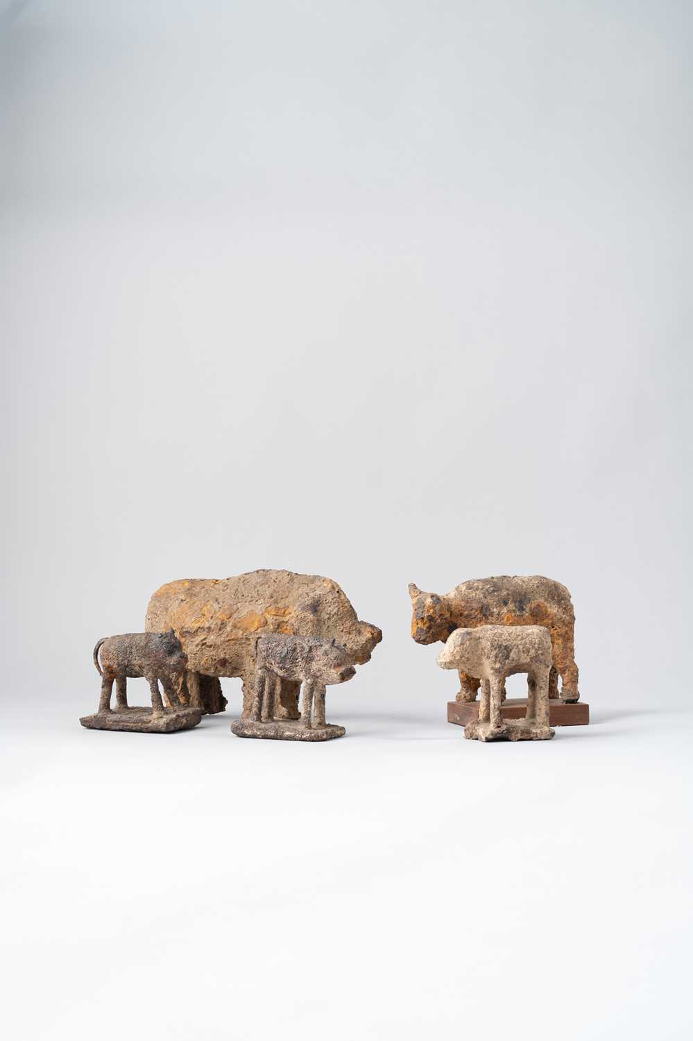 NO RESERVE FOUR CHINESE IRON MODELS OF OXEN AND A LARGE PIG TANG DYNASTY Each figure standing four-