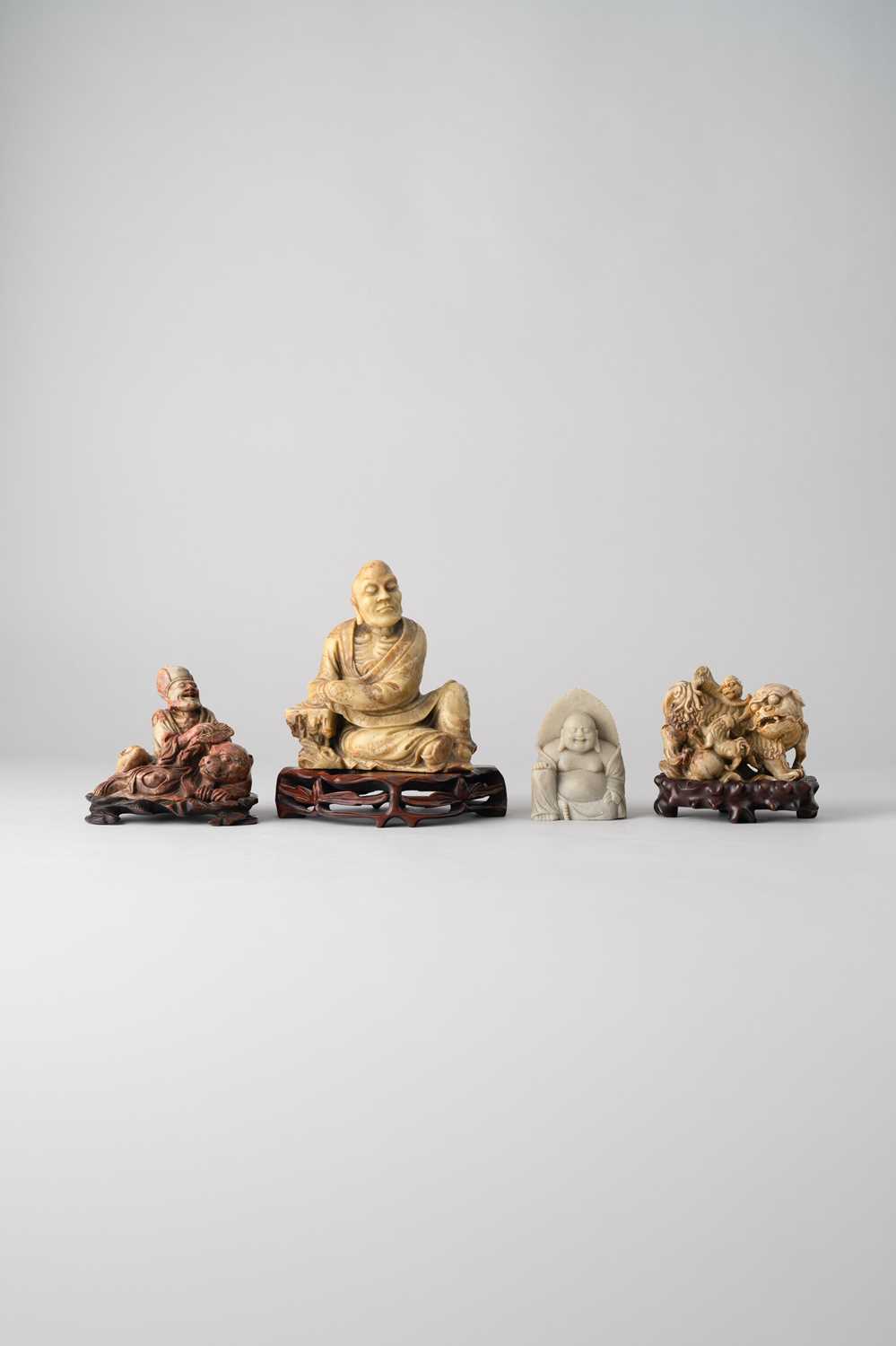 NO RESERVE FOUR CHINESE SOAPSTONE FIGURES 19TH CENTURY AND 20TH CENTURY One depicting a seated