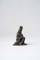 NO RESERVE A CHINESE BRONZE FIGURE OF GUANYIN QING DYNASTY OR LATER The seated Goddess holding a