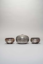 A DECCAN SILVER-INLAID BIDRI CIRCULAR BOX AND COVER 19TH CENTURY Decorated with geometric bands of