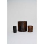 THREE CHINESE BRUSHPOTS, BITONG QING DYNASTY Two in hardwood, the third in bamboo, incised with a