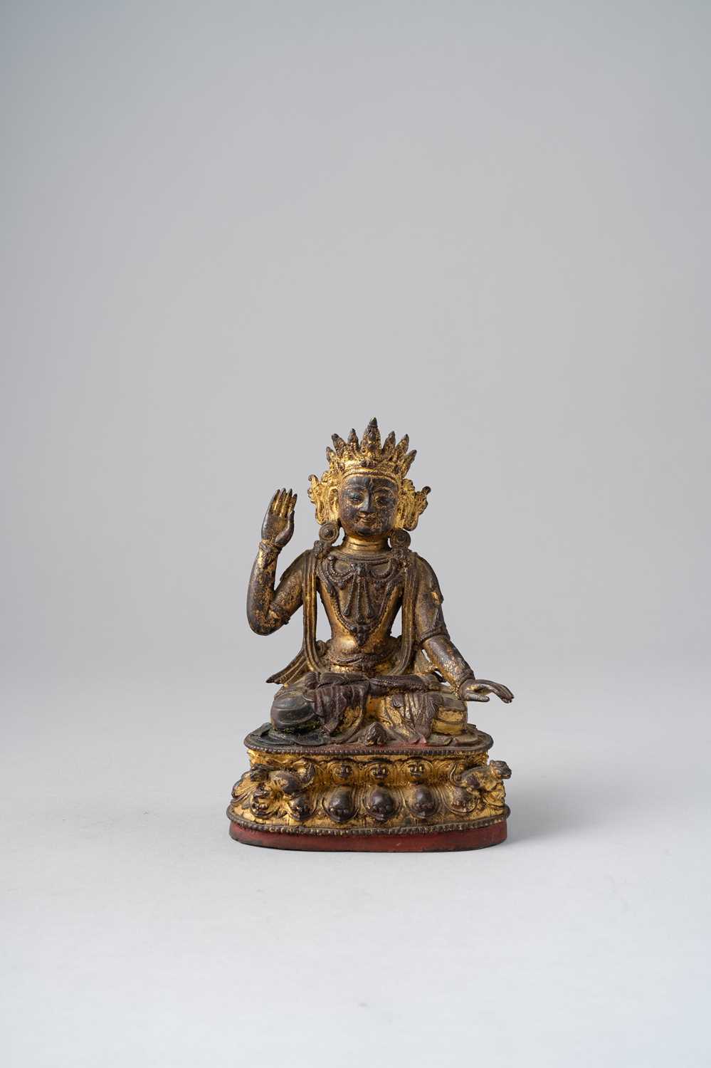 A CHINESE GILT-LACQUERED BRONZE FIGURE OF A BODHISATTVA LATE MING DYNASTY Seated in dhyanasana