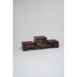 NO RESERVE A CHINESE THREE-TIERED HARDWOOD STAND LATE QING DYNASTY With square tops above a