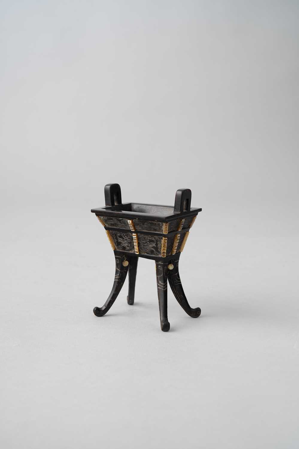 NO RESERVE A SMALL CHINESE HARDWOOD MODEL OF AN ARCHAISTIC INCENSE BURNER, DING QING DYNASTY OR