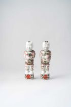 NO RESERVE A PAIR OF CHINESE WUCAI FIGURES OF BOYS 17TH CENTURY Each boy holding a vase with lotus