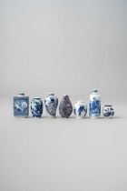 SEVEN CHINESE BLUE AND WHITE SNUFF BOTTLES QING DYNASTY One of rectangular section decorated with