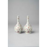 A PAIR OF CHINESE FAMILLE ROSE BOTTLE VASES REPUBLIC PERIOD Decorated with roundels inscribed with
