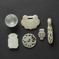A SMALL COLLECTION OF CHINESE CELADON JADE AND JADEITE ITEMS QING DYNASTY AND LATER Comprising: a