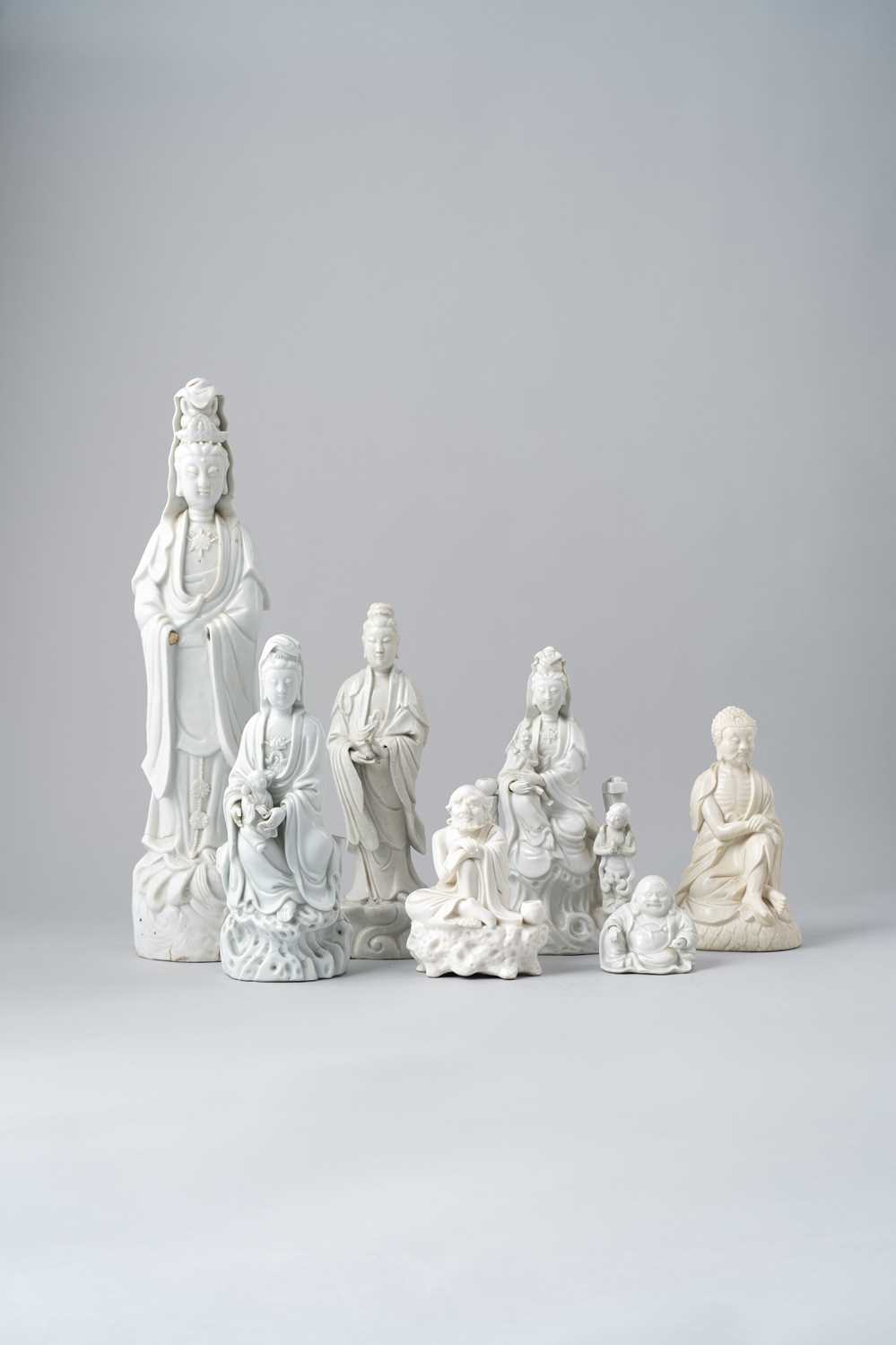 NO RESERVE SEVEN CHINESE BLANC DE CHINE FIGURES 18TH CENTURY AND LATER Four representing Guanyin,