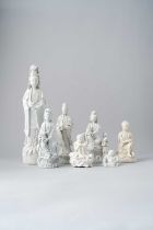 NO RESERVE SEVEN CHINESE BLANC DE CHINE FIGURES 18TH CENTURY AND LATER Four representing Guanyin,