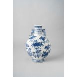 A CHINESE BLUE AND WHITE PEACH AND POMEGRANATE MOONFLASK, BIANHU 19TH CENTURY The body painted