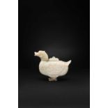 A CHINESE CELADON JADE ARCHAISTIC 'DUCK' VESSEL AND COVER LATE QING DYNASTY Modelled in the shape of